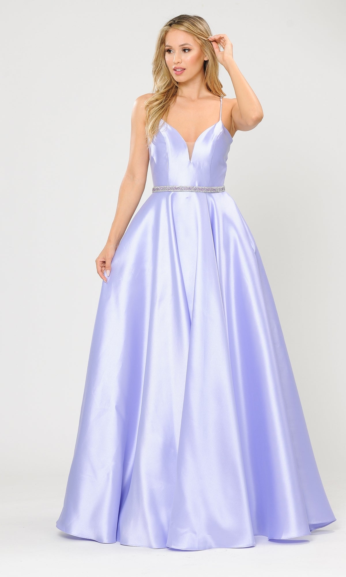 A woman in a lilac Strappy-Back Long Mikado A-Line Prom Dress 8688, featuring a fitted bodice and thin straps, stands against a plain background.